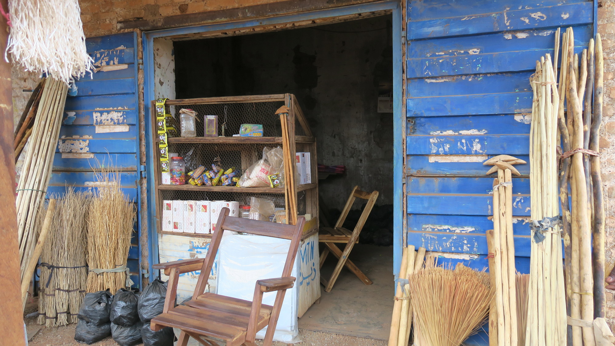 Image of Peter Rosario's store from which he sells items including charcoal, batteries and cooking oil. 