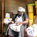 Image of Lylian Adhiambo, a baker and entrepreneur with a disability.