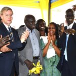 Lothar Jaschke, Deputy Head of the European Union Delegation to South Sudan, Omot Okony, Undersecretary in the Ministry of General Education and Instruction, Lucy Nyaga, International Director of Programmes at Light for the World and Professor John Aketch, Vice Chancellor of the University of Juba, at the opening of the Inclusive Resource Centre at the University of Juba. All are smiling and applauding.